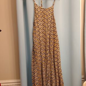 Chic Snake Print Maxi Dress in Black and Gold